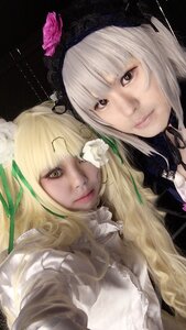 Rating: Safe Score: 0 Tags: 2girls bangs blonde_hair brown_eyes closed_mouth flower hair_ornament hat lips long_hair looking_at_viewer multiple_cosplay multiple_girls rose sisters smile tagme white_rose User: admin