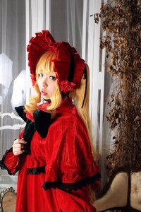 Rating: Safe Score: 0 Tags: 1girl bangs blonde_hair blue_eyes bonnet curtains dress flower lips long_hair long_sleeves looking_at_viewer red_dress rose shinku solo User: admin