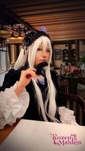 Rating: Safe Score: 0 Tags: 1girl dress flower frills gothic_lolita lips lolita_fashion long_hair long_sleeves purple_eyes rose sitting solo suigintou User: admin