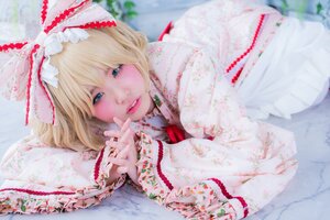 Rating: Safe Score: 0 Tags: 1girl blonde_hair blue_eyes blurry blurry_foreground bow depth_of_field eyelashes hair_ribbon hinaichigo lips looking_at_viewer lying nail_polish on_side on_stomach parted_lips photo ribbon short_hair solo User: admin