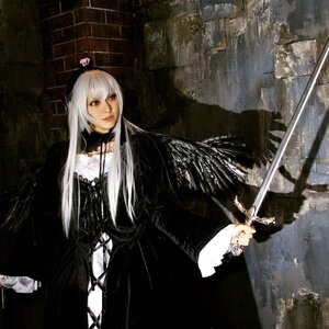 Rating: Safe Score: 0 Tags: 1girl dress long_hair long_sleeves looking_at_viewer red_eyes solo standing suigintou sword water weapon white_hair User: admin
