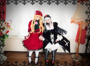 Rating: Safe Score: 0 Tags: 2girls black_dress blonde_hair boots closed_eyes curtains dress flower holding_hands long_hair multiple_cosplay multiple_girls pantyhose rose shinku silver_hair suigintou tagme wings User: admin