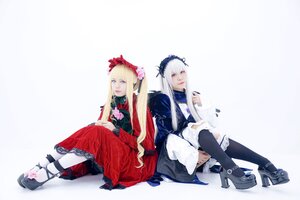 Rating: Safe Score: 0 Tags: 2girls bangs black_footwear black_legwear blonde_hair blue_eyes bow dress flower high_heels knees_up long_hair long_sleeves looking_at_viewer multiple_cosplay multiple_girls pantyhose red_dress shinku shoes simple_background sitting smile tagme User: admin