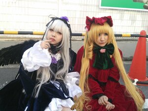 Rating: Safe Score: 0 Tags: 2girls 91076 black_wings blonde_hair dress lips long_hair long_sleeves looking_at_viewer multiple_cosplay multiple_girls shinku sitting suigintou tagme very_long_hair wings User: admin