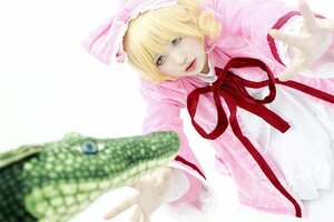 Rating: Safe Score: 0 Tags: 1girl blonde_hair blurry depth_of_field dress green_eyes hinaichigo lips looking_at_viewer motion_blur photo ribbon simple_background solo User: admin