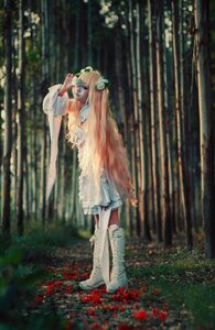 Rating: Safe Score: 0 Tags: 1girl blonde_hair blue_eyes boots dress flower forest kirakishou long_hair nature solo standing very_long_hair weapon white_dress User: admin
