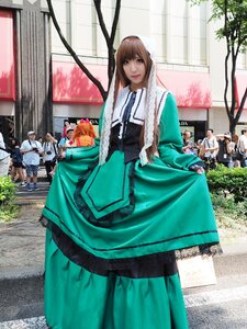 Rating: Safe Score: 0 Tags: brown_hair dress green_dress long_hair looking_at_viewer multiple_boys multiple_girls necktie solo standing suiseiseki User: admin