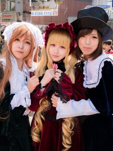 Rating: Safe Score: 0 Tags: 3girls blonde_hair dress drill_hair flower frills hat lips long_hair looking_at_viewer multiple_cosplay multiple_girls realistic smile tagme User: admin