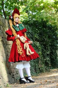 Rating: Safe Score: 0 Tags: 1girl blonde_hair blue_eyes bonnet bow doll dress flower long_hair pantyhose red_dress shinku shoes solo stuffed_animal white_legwear User: admin