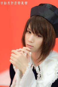Rating: Safe Score: 0 Tags: 1girl blurry brown_hair closed_mouth depth_of_field hands_clasped hands_together hat interlocked_fingers lips looking_at_viewer own_hands_together realistic red_background red_eyes short_hair simple_background solo souseiseki User: admin