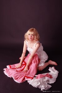 Rating: Safe Score: 0 Tags: 1girl artist_name bangs bare_shoulders barefoot blonde_hair dress frills full_body green_eyes hinaichigo lips looking_at_viewer pink_dress realistic sitting solo white_dress User: admin