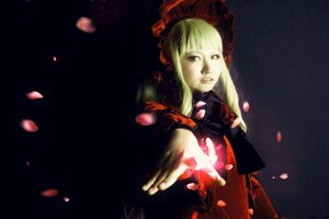 Rating: Safe Score: 0 Tags: 1girl blonde_hair bonnet dress flower long_hair long_sleeves outstretched_arm outstretched_hand petals rose rose_petals shinku solo User: admin