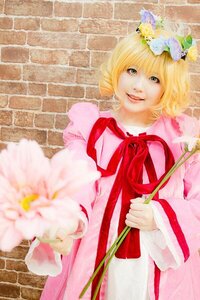 Rating: Safe Score: 0 Tags: 1girl blonde_hair blurry dress flower green_eyes hinaichigo lips pink_dress ribbon short_hair solo User: admin