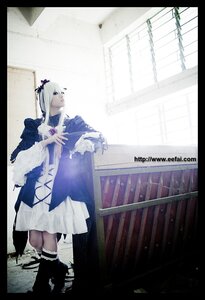 Rating: Safe Score: 0 Tags: 1girl black_border dress hair_ornament letterboxed pillarboxed solo standing suigintou thighhighs white_hair User: admin