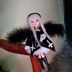 Rating: Safe Score: 0 Tags: 1girl bangs black_footwear blue_eyes boots cape cross-laced_footwear doll dress fur_trim hairband knee_boots lace-up_boots long_hair looking_at_viewer photo solo standing suigintou white_hair User: admin