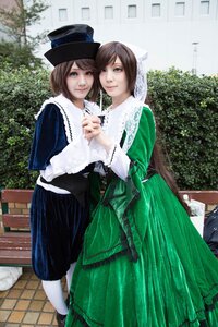 Rating: Safe Score: 0 Tags: 2girls bangs blue_eyes brown_hair dress green_dress green_eyes hat holding_hands looking_at_viewer multiple_cosplay multiple_girls outdoors pantyhose short_hair souseiseki swept_bangs tagme top_hat white_legwear User: admin