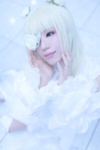 Rating: Safe Score: 0 Tags: 1girl blurry blurry_background blurry_foreground depth_of_field flower hand_on_own_cheek kirakishou lips looking_at_viewer photo solo striped upper_body white_flower white_hair User: admin