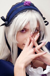 Rating: Safe Score: 0 Tags: 1girl bangs bow closed_mouth fingernails flower frills hairband long_hair looking_at_viewer purple_eyes rose silver_hair solo suigintou User: admin