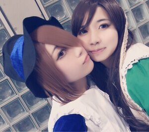 Rating: Safe Score: 0 Tags: 2girls bangs brown_hair closed_mouth hat indoors looking_at_viewer multiple_cosplay multiple_girls short_hair smile tagme window User: admin