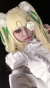 Rating: Safe Score: 0 Tags: 1girl bangs black_background blonde_hair brown_eyes flower frills hair_flower hair_ornament kirakishou lips long_hair looking_at_viewer reaching_out ribbon rose solo upper_body white_flower white_rose User: admin