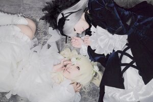 Rating: Safe Score: 0 Tags: 2girls black_dress blonde_hair closed_eyes dress flower frills gothic_lolita lolita_fashion long_hair long_sleeves lying multiple_cosplay multiple_girls on_side sisters suigintou tagme User: admin