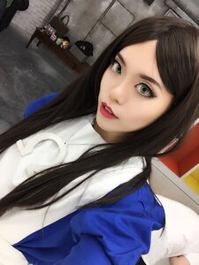 Rating: Safe Score: 0 Tags: 1girl black_hair green_eyes lips lipstick long_hair looking_at_viewer makeup red_lipstick solo souseiseki User: admin