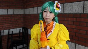 Rating: Safe Score: 0 Tags: 1girl auto_tagged brick_wall dress flower frills green_hair kanaria lips solo upper_body yellow_dress User: admin