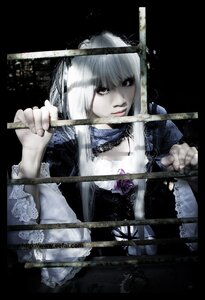 Rating: Safe Score: 0 Tags: 1girl auto_tagged bangs black_background choker dress frills holding lips long_sleeves solo suigintou upper_body User: admin