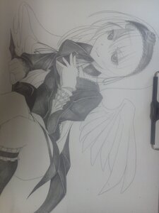Rating: Safe Score: 0 Tags: 1girl bangs closed_mouth dress eyebrows_visible_through_hair feathered_wings frills greyscale hairband image juliet_sleeves kneehighs long_sleeves looking_at_viewer lying monochrome photo smile solo suigintou traditional_media wings User: admin