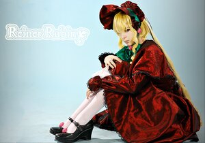 Rating: Safe Score: 0 Tags: 1girl blonde_hair blue_eyes bonnet bow dress flower jewelry joints long_hair long_sleeves platform_footwear red_dress rose shinku sitting solo User: admin