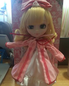 Rating: Safe Score: 0 Tags: 1girl blonde_hair blue_eyes capelet curtains doll dress hair_ribbon hinaichigo indoors looking_at_viewer medicine_melancholy ribbon smile solo User: admin
