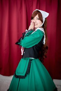 Rating: Safe Score: 0 Tags: 1girl brown_hair curtains dress green_dress green_eyes long_hair long_sleeves looking_at_viewer smile solo suiseiseki User: admin