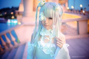 Rating: Safe Score: 0 Tags: 1girl bangs blue_hair blurry blurry_background blurry_foreground depth_of_field dress flower frills hair_flower hair_ornament kirakishou long_hair photo smile solo watermark white_hair User: admin