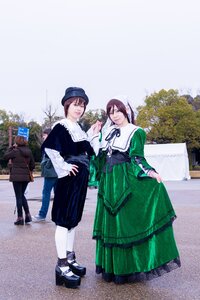 Rating: Safe Score: 0 Tags: 2girls bangs blue_eyes brown_hair day dress green_dress hat long_sleeves looking_at_viewer multiple_cosplay multiple_girls outdoors pantyhose short_hair smile standing tagme white_legwear User: admin