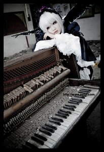 Rating: Safe Score: 0 Tags: 1girl auto_tagged dress electric_guitar frills guitar instrument letterboxed playing_instrument solo suigintou white_hair User: admin