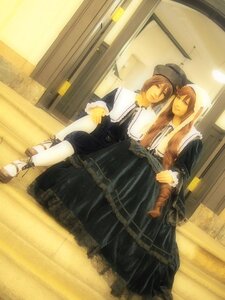 Rating: Safe Score: 0 Tags: 2girls black_dress brown_hair closed_eyes dress hat indoors long_sleeves multiple_cosplay multiple_girls sitting tagme User: admin