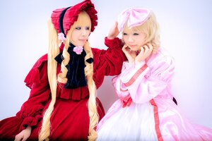 Rating: Safe Score: 0 Tags: 2girls 91076 blonde_hair blue_eyes bonnet bow dress long_hair long_sleeves looking_at_viewer multiple_cosplay multiple_girls shinku siblings sisters striped tagme vertical_stripes very_long_hair User: admin