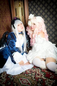 Rating: Safe Score: 0 Tags: 2girls black_wings dress feathers frills hairband long_hair multiple_cosplay multiple_girls red_eyes sitting tagme thighhighs white_dress white_hair white_legwear wings yellow_eyes User: admin