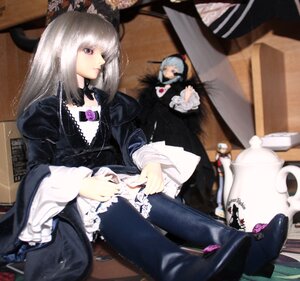 Rating: Safe Score: 0 Tags: 1girl blurry doll dress figure frills gothic_lolita lolita_fashion long_hair photo silver_hair sitting solo suigintou User: admin