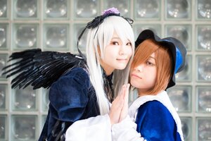 Rating: Safe Score: 0 Tags: 2girls black_wings blonde_hair blurry brown_eyes depth_of_field dress feathers hat indoors long_hair long_sleeves looking_at_viewer multiple_cosplay multiple_girls siblings sisters smile suigintou tagme window wings User: admin