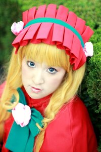 Rating: Safe Score: 0 Tags: 1girl bangs blonde_hair blue_eyes blurry bonnet depth_of_field flower food grass lips long_hair looking_at_viewer shinku smile solo User: admin