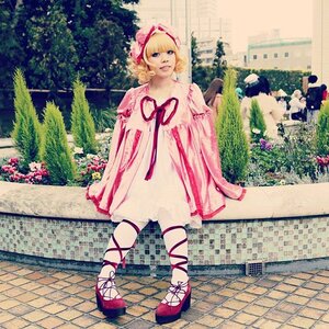 Rating: Safe Score: 0 Tags: 1girl ankle_lace-up blonde_hair blue_eyes building city cross-laced_footwear dress fence flower hinaichigo joints ribbon short_hair solo standing tree User: admin