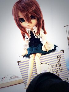 Rating: Safe Score: 0 Tags: 1girl bangs black_dress blue_eyes doll dress hair_between_eyes kneehighs long_sleeves looking_at_viewer no_shoes photo sitting solo souseiseki standing striped white_legwear User: admin