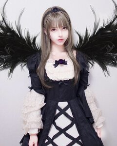 Rating: Safe Score: 0 Tags: 1girl blonde_hair dress lips long_hair purple_eyes realistic solo suigintou weapon wings User: admin
