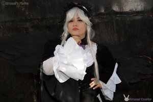 Rating: Safe Score: 0 Tags: 1girl artist_name black_dress black_wings closed_mouth dress lips long_sleeves solo suigintou watermark wings User: admin