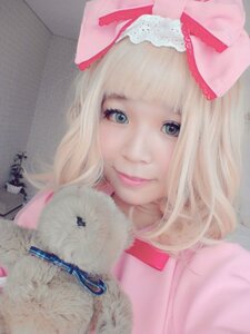 Rating: Safe Score: 0 Tags: 1girl animal bangs blonde_hair blue_eyes bow closed_mouth dog hair_bow hinaichigo lips looking_at_viewer photo ribbon smile solo upper_body User: admin