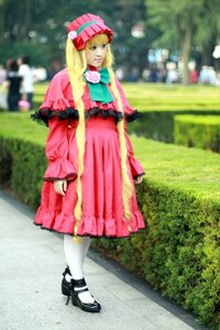 Rating: Safe Score: 0 Tags: 1girl black_footwear blonde_hair blue_eyes blurry blurry_background depth_of_field dress hat long_hair long_sleeves outdoors pantyhose photo photo_background pink_dress scarf shinku solo standing white_legwear User: admin
