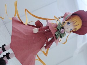 Rating: Safe Score: 0 Tags: 1girl blonde_hair blue_eyes bonnet bow bowtie capelet doll dress flower green_bow green_neckwear hat long_hair long_sleeves looking_at_viewer photo red_dress rose shinku sidelocks solo standing twintails very_long_hair User: admin