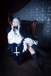 Rating: Safe Score: 0 Tags: 1girl black_legwear dress frills gothic_lolita kneehighs lolita_fashion mary_janes shoes sitting solo suigintou white_hair User: admin