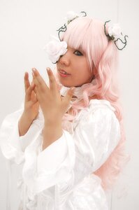 Rating: Safe Score: 0 Tags: 1girl bangs flower hair_flower hands kirakishou lips long_hair long_sleeves looking_at_viewer own_hands_together pink_hair realistic solo striped vertical_stripes white_flower User: admin